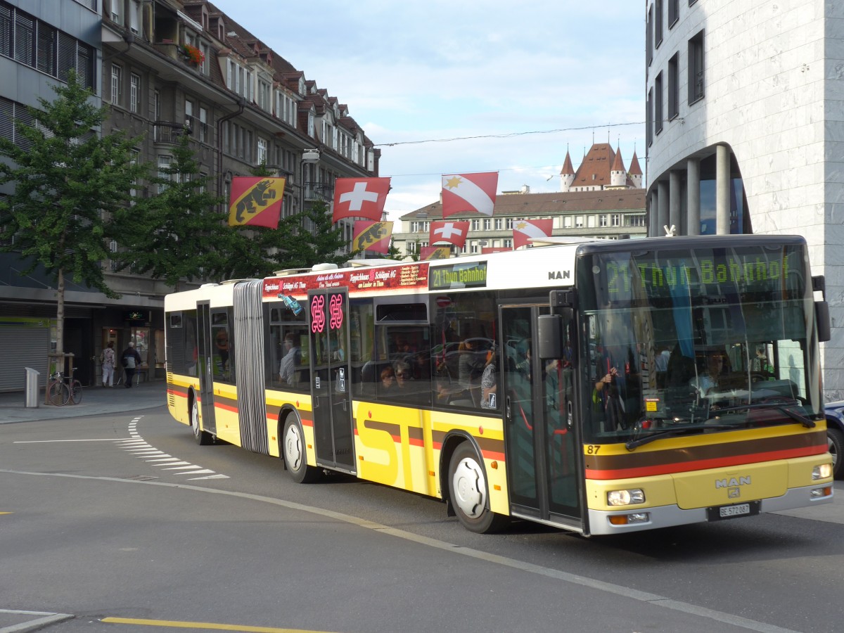 (155'310) - STI Thun - Nr. 87/BE 572'087 - MAN am 20. September 2014 beim Bahnhof Thun