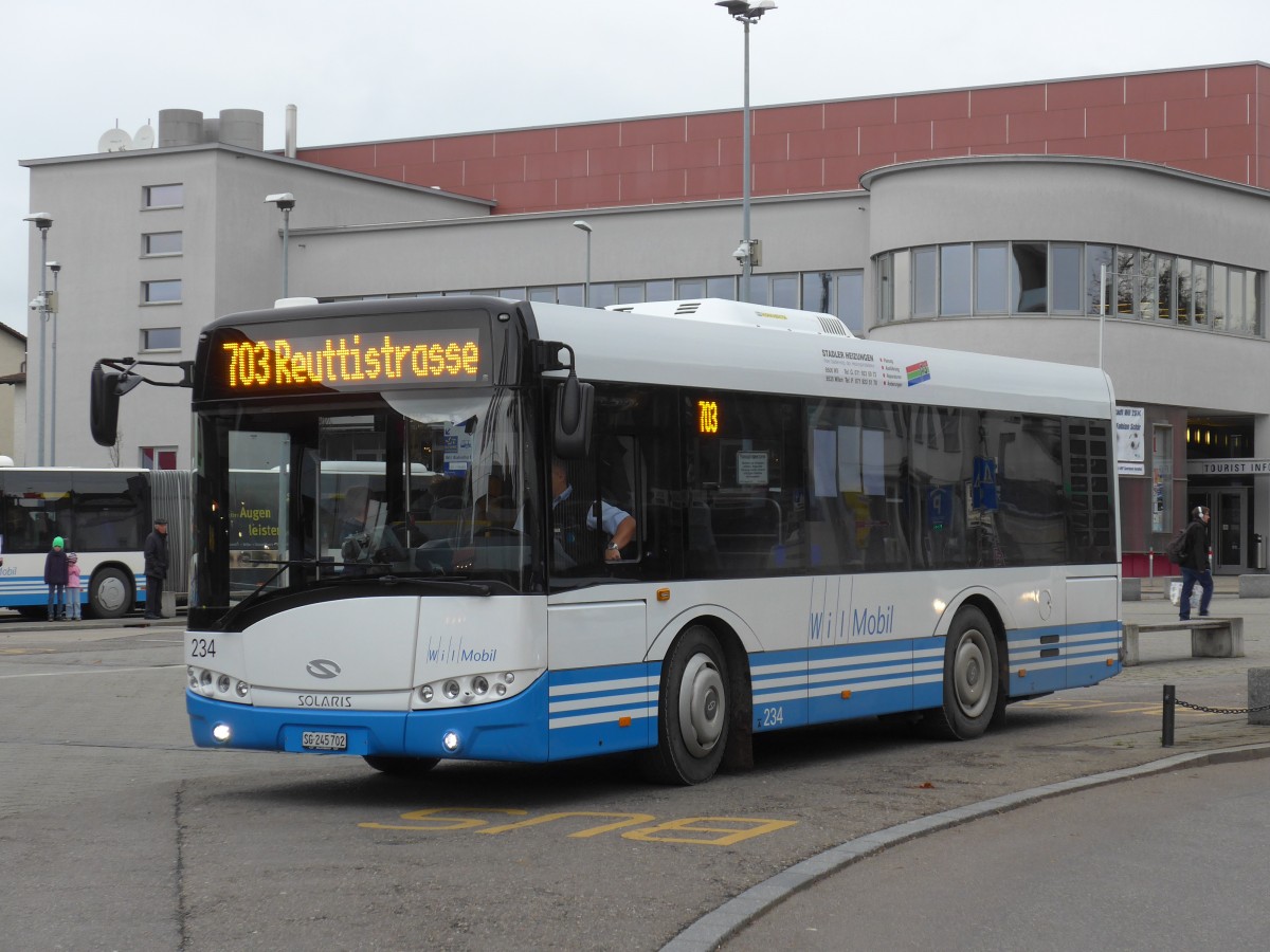 (155'920) - WilMobil, Wil - Nr. 234/SG 245'702 - Solaris am 22. Oktober 2014 beim Bahnhof Wil