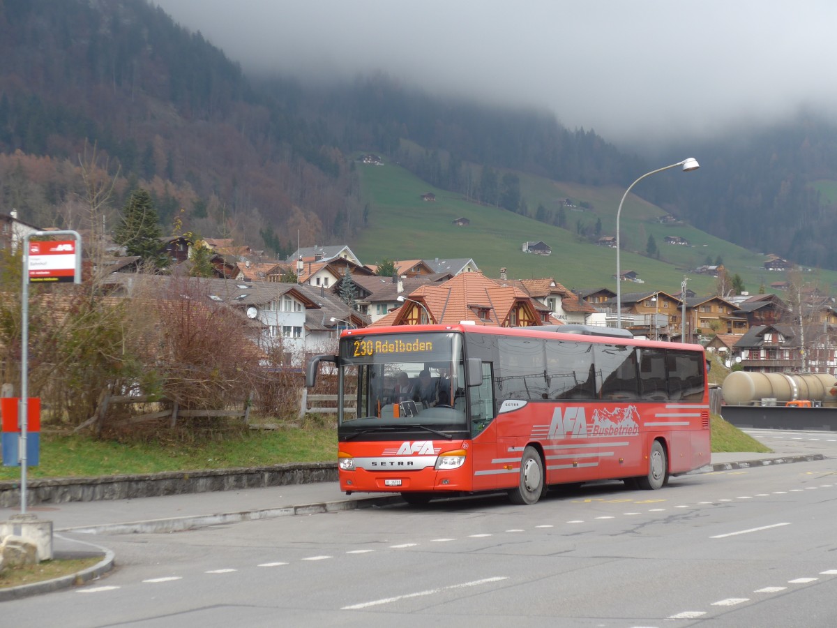 (157'702) - AFA Adelboden - Nr. 24/BE 26'701 - Setra am 7. Dezember 2014 beim Bahnhof Frutigen