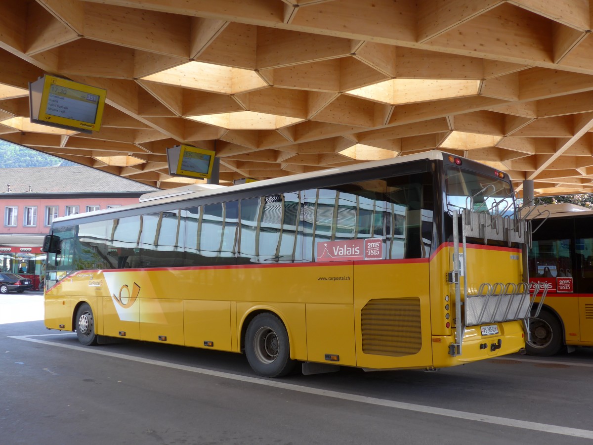 (160'443) - PostAuto Wallis - Nr. 18/VS 365'408 - Irisbus am 10. Mai 2015 beim Bahnhof Sion