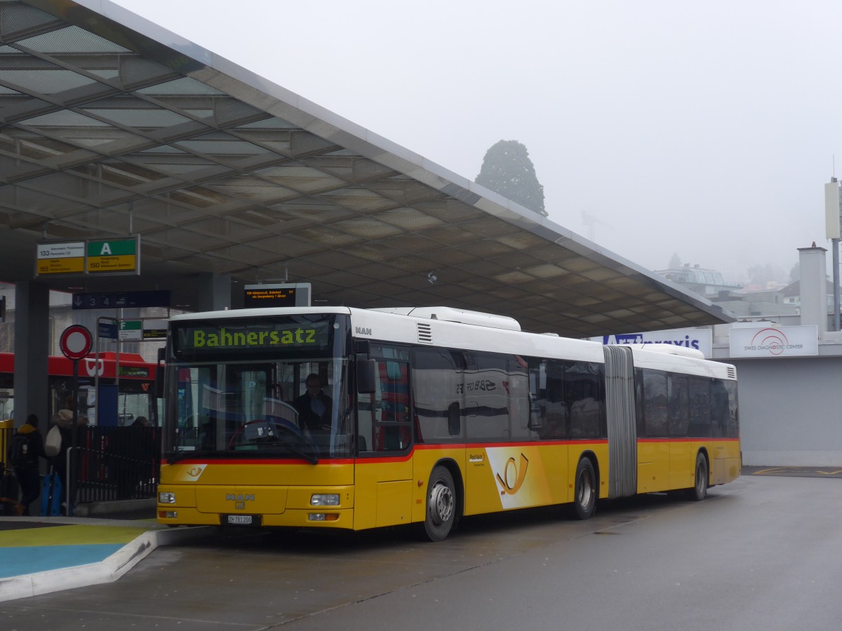 (168'172) - PostAuto Zrich - Nr. 165/ZH 781'200 - MAN am 1. Januar 2016 beim Bahnhof Horgen