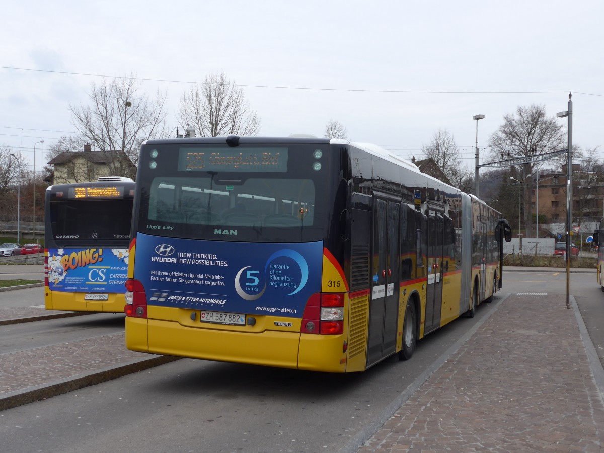 (168'885) - PostAuto Zrich - Nr. 315/ZH 587'882 - MAN am 24. Februar 2016 beim Bahnhof Blach