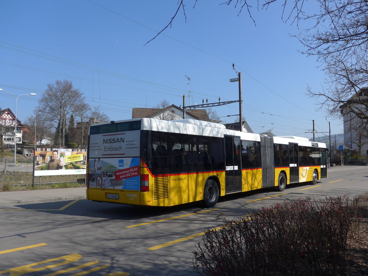 (169'316) - PostAuto Zrich - Nr. 143/ZH 780'685 - MAN (ex Nr. 20; ex P 26'015) am 19. Mrz 2016 beim Bahnhof Blach