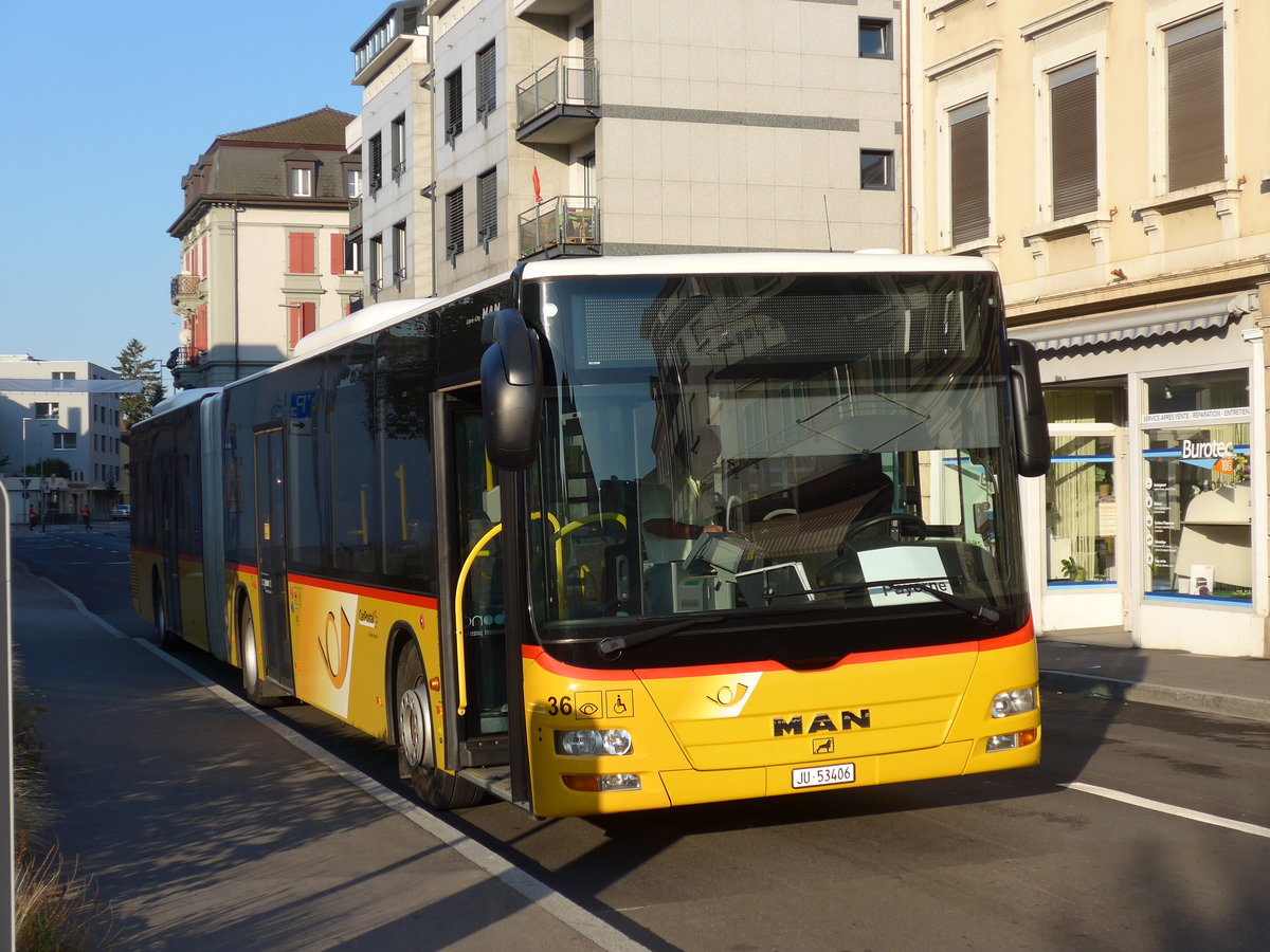 (174'336) - CarPostal Ouest - Nr. 36/JU 53'406 - MAN am 28. August 2016 beim Bahnhof Payerne