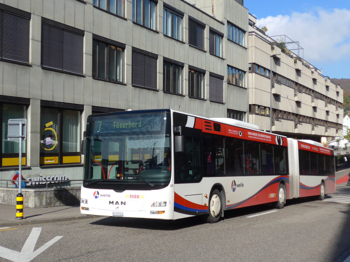 (176'247) - Twerenbold, Baden - Nr. 302/AG 459'042 - MAN am 22. Oktober 2016 beim Bahnhof Baden