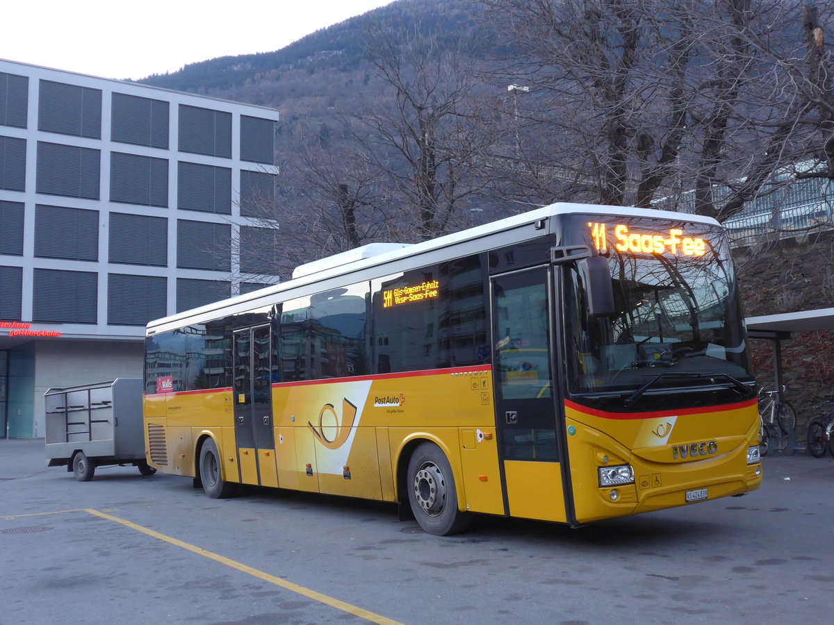 (176'856) - PostAuto Wallis - VS 424'839 - Iveco am 4. Dezember 2016 beim Bahnhof Brig