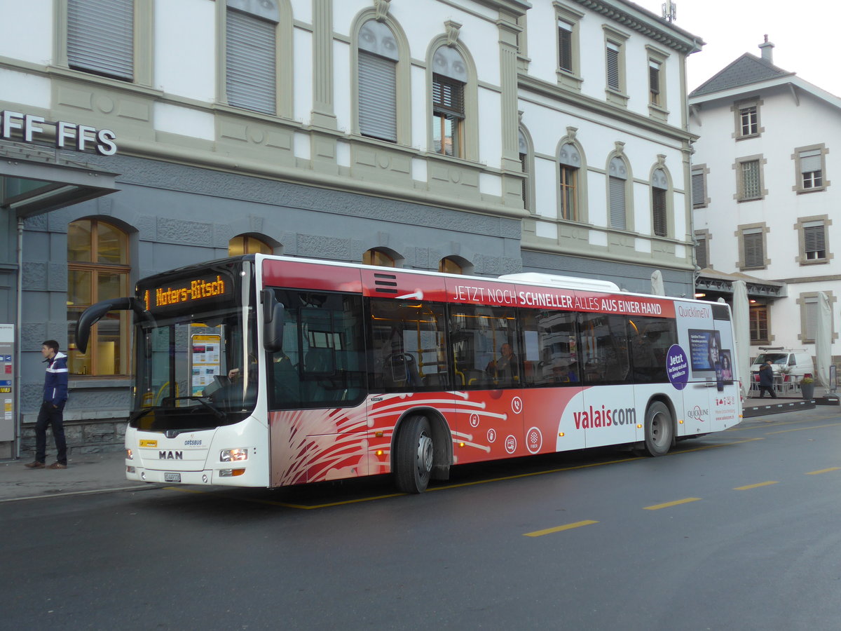 (177'551) - PostAuto Wallis - VS 449'118 - MAN am 1. Januar 2017 beim Bahnhof Brig