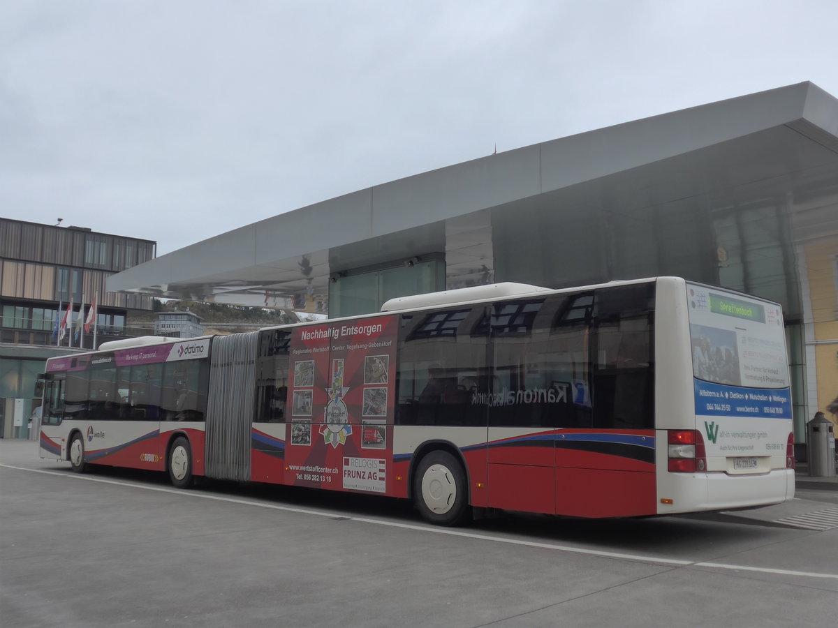 (178'999) - RVBW Wettingen - Nr. 153/AG 228'163 - MAN am 20. Mrz 2017 beim Bahnhof Baden