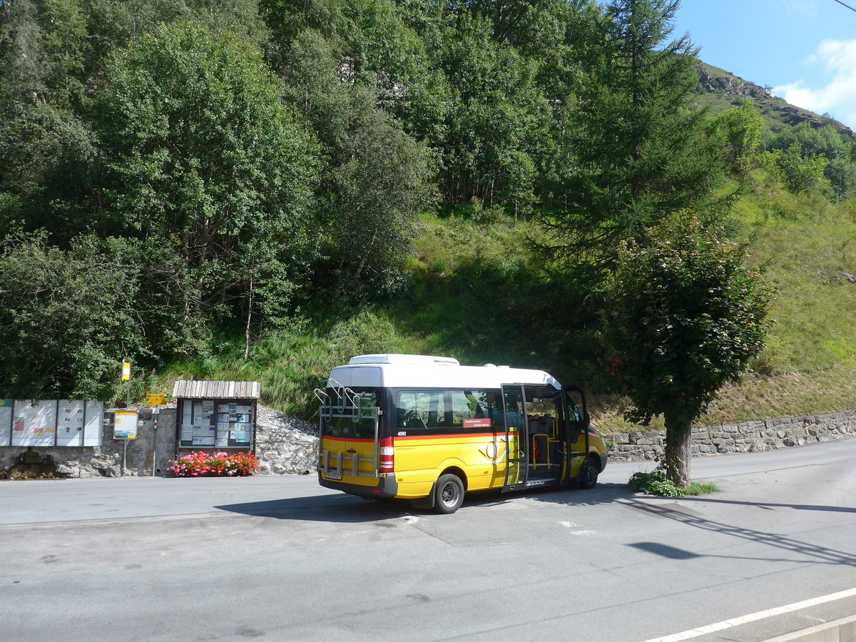 (182'714) - PostAuto Graubnden - GR 65'917 - Mercedes am 5. August 2017 beim Bahnhof Guarda