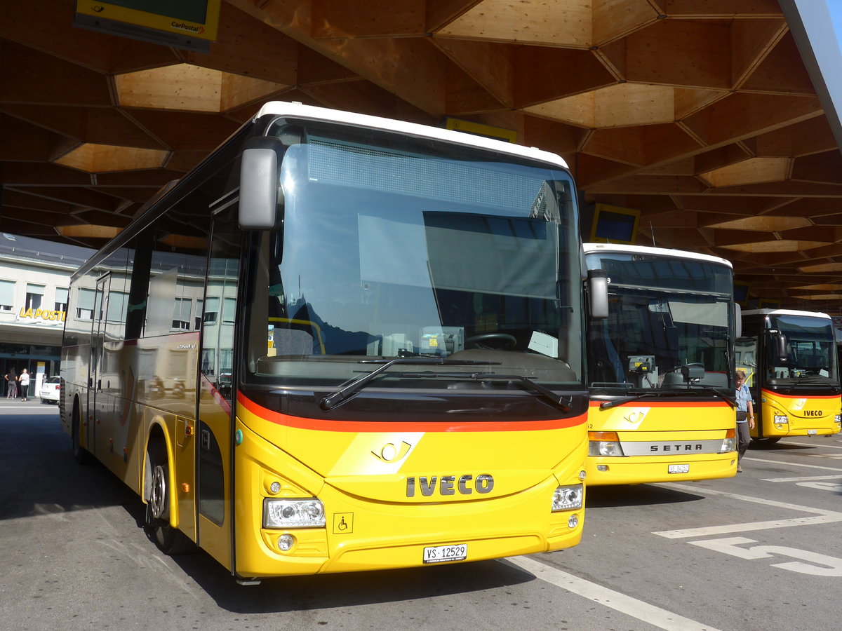 (184'149) - Mabillard, Lens - VS 12'529 - Iveco am 25. August 2017 beim Bahnhof Sion