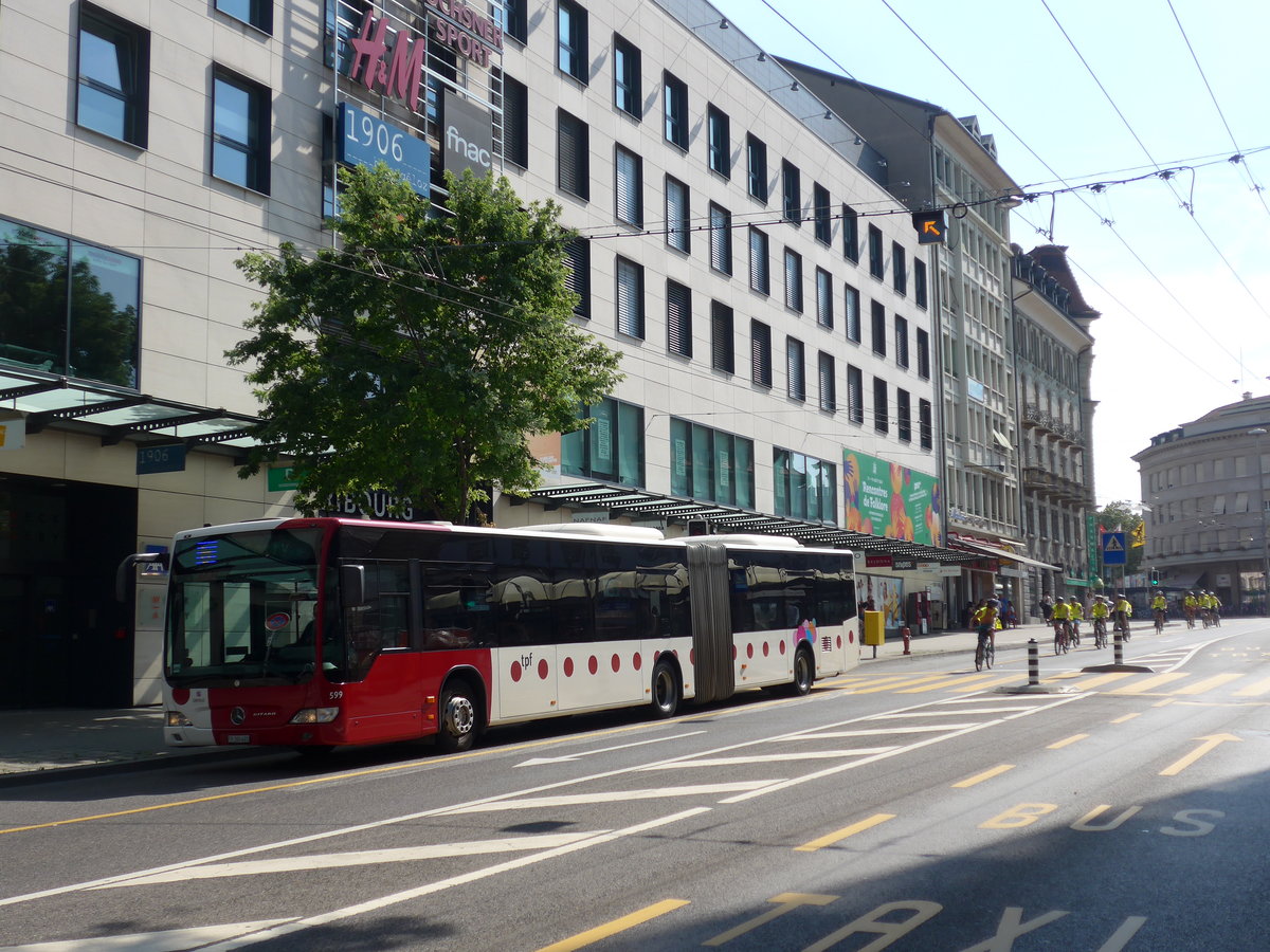 (195'621) - TPF Fribourg - Nr. 599/FR 300'420 - Mercedes am 5. August 2018 beim Bahnhof Fribourg