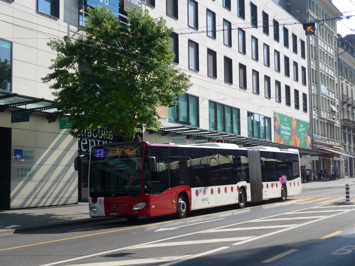 (195'637) - TPF Fribourg - Nr. 556/FR 300'412 - Mercedes am 5. August 2018 beim Bahnhof Fribourg