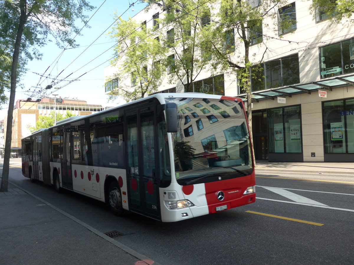 (195'638) - TPF Fribourg - Nr. 154/FR 300'231 - Mercedes am 5. August 2018 beim Bahnhof Fribourg