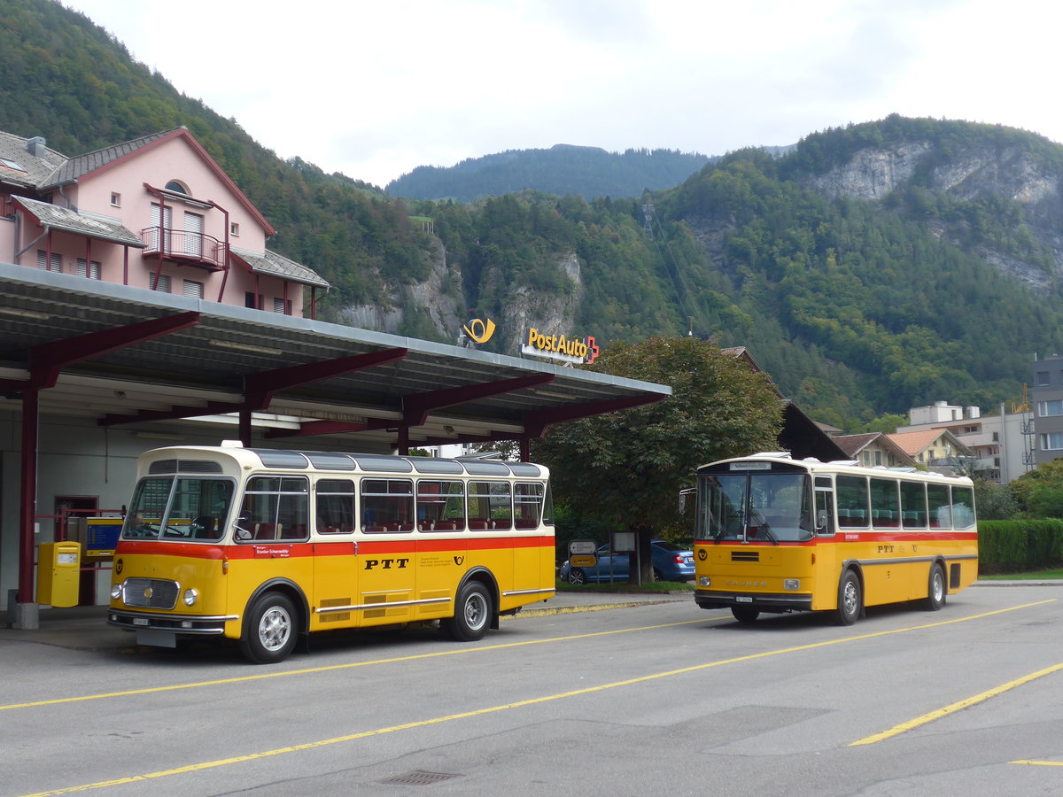 (197'706) - Frutig, Birmensdorf - ZH 560'883 - FBW/FHS (ex P 23'217) + Schmid, Thrishaus - BE 26'206 - Saurer/Tscher (ex P 24'244) am 16. September 2018 in Meiringen, Postautostation