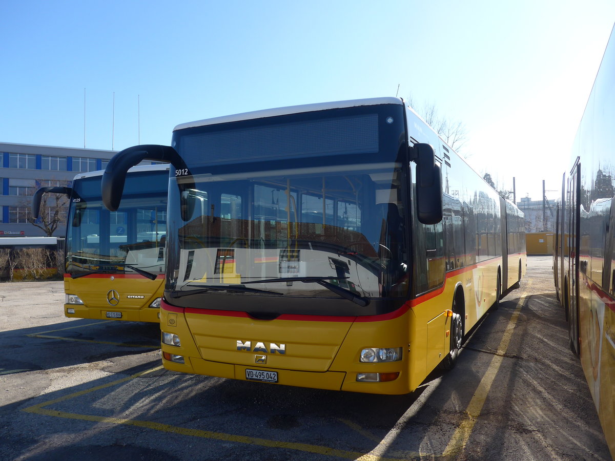 (201'626) - CarPostal Ouest - VD 495'042 - MAN am 16. Februar 2019 in Yverdon, Garage