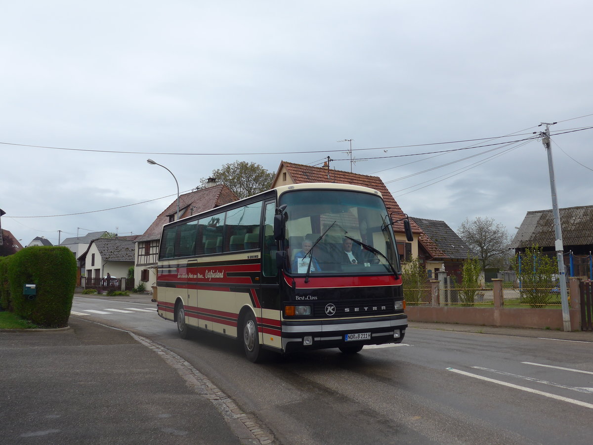 (204'181) - Aus Deutschland: Buck's Reisen, Grossheide - NOR-B 211H - Setra am 27. April 2019 in Stundwiller, Rue Principale