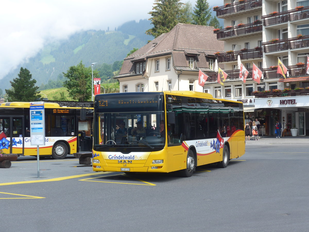 (207'675) - AVG Grindelwald - Nr. 13/BE 407'170 - MAN/Gppel am 9. Juli 2019 beim Bahnhof Grindelwald