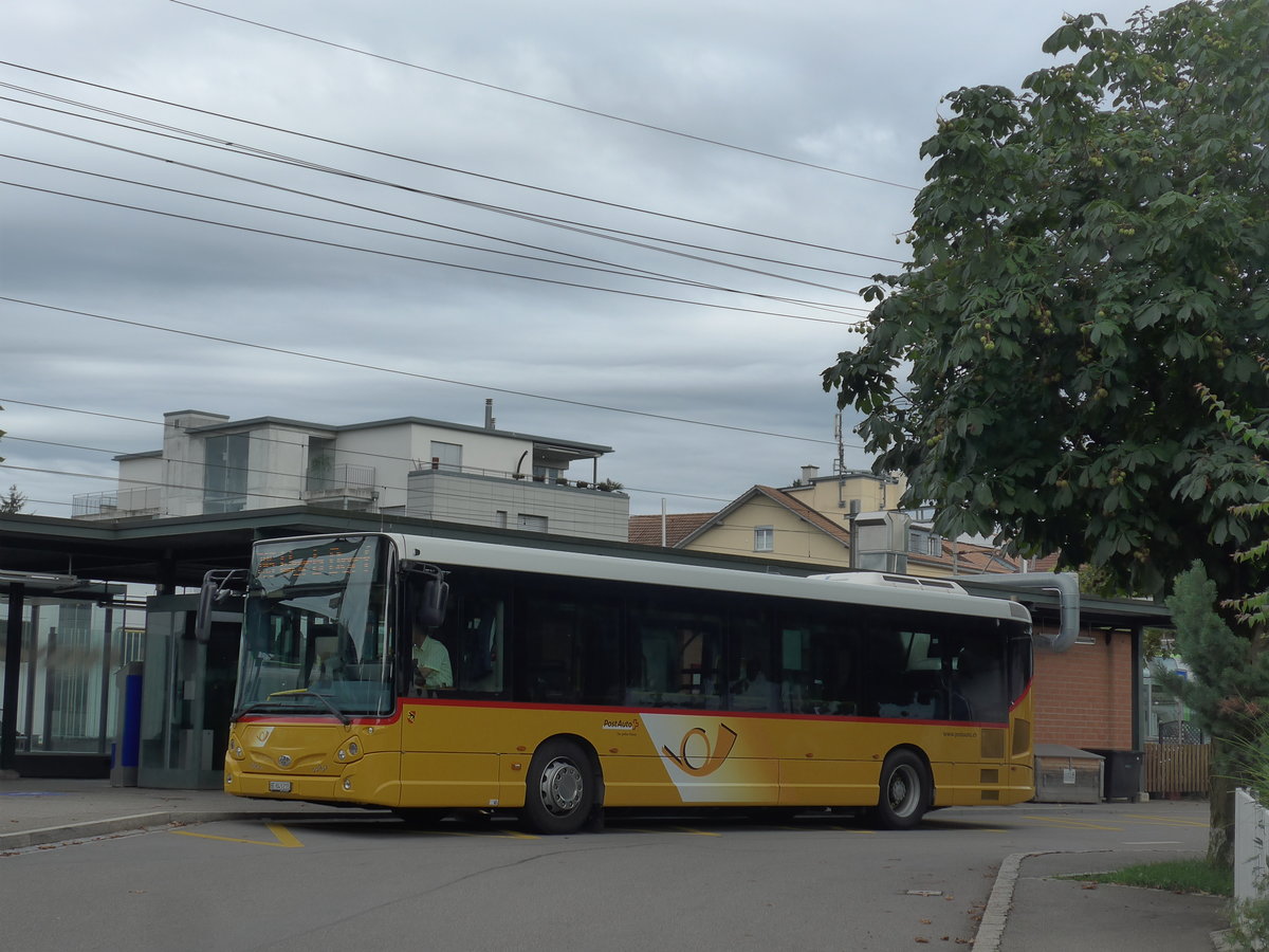 (208'578) - PostAuto Bern - Nr. 215/BE 843'215 - Heuliez am 10. August 2019 beim Bahnhof Rubigen