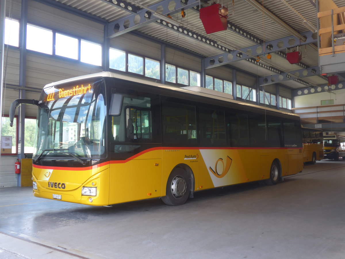 (208'706) - PostAuto Graubnden - GR 168'873 - Iveco am 11. August 2019 in Schiers, Garage