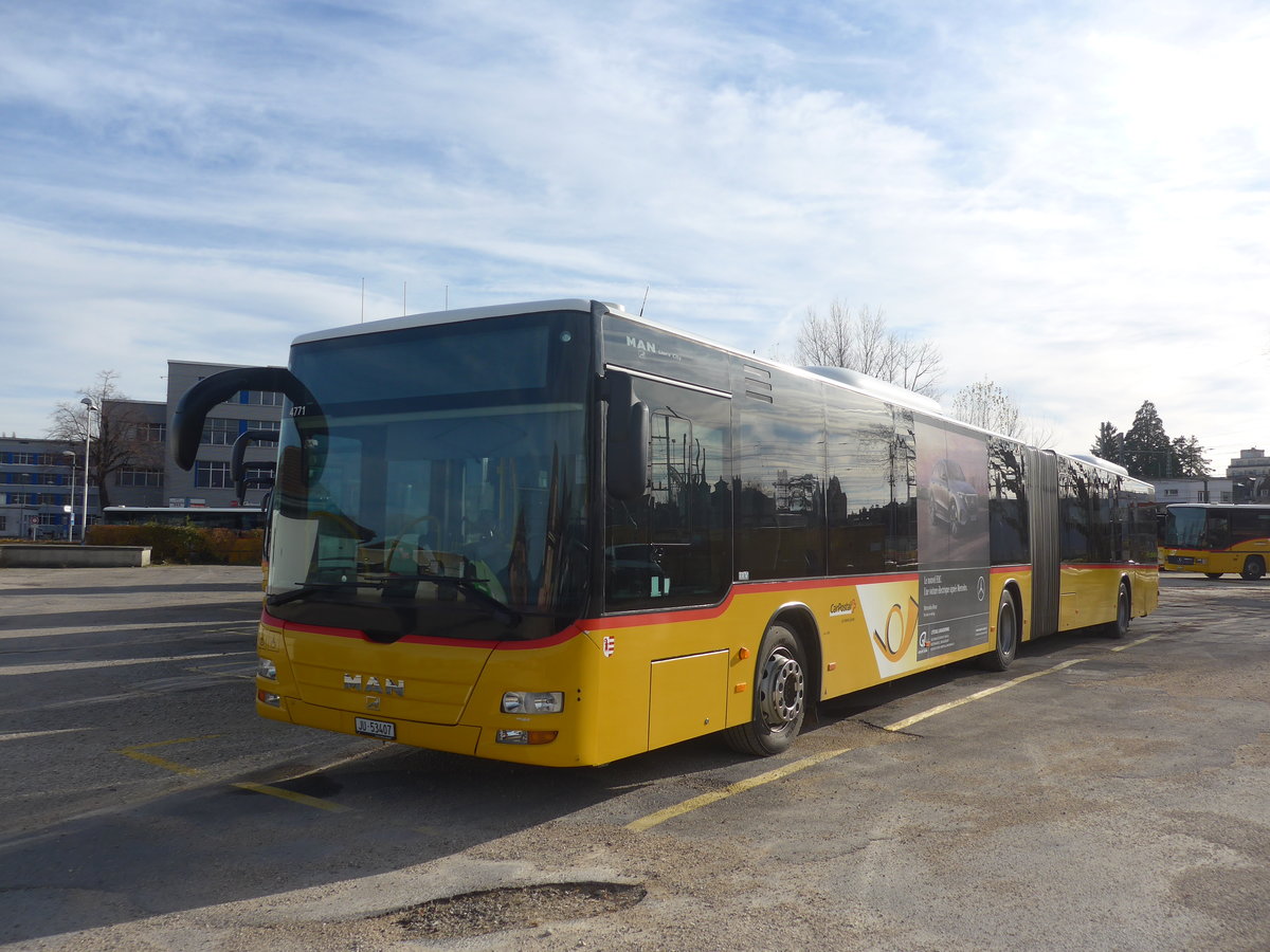 (212'781) - CarPostal Ouest - JU 53'407 - MAN (ex Nr. 37) am 8. Dezember 2019 in Yverdon, Garage