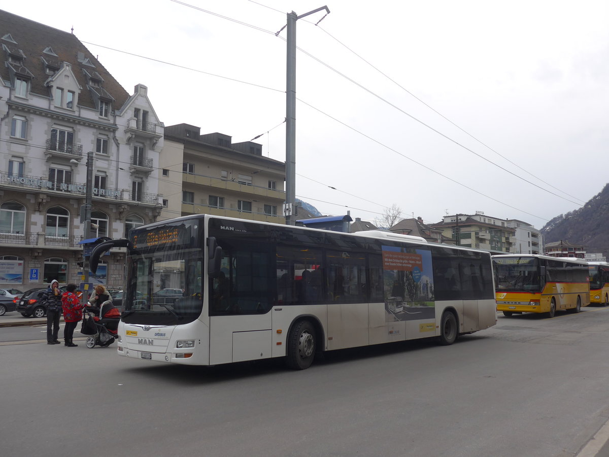 (214'922) - PostAuto Wallis - VS 449'116 - MAN am 29. Februar 2020 beim Bahnhof Brig