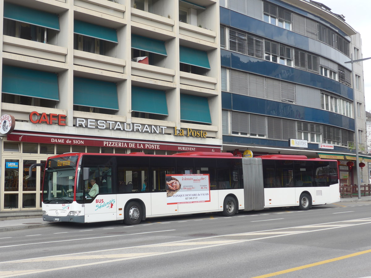 (215'332) - PostAuto Wallis - Nr. 65/VS 186'400 - Mercedes (ex Lathion, Sion Nr. 65) am 20. Mrz 2020 beim Bahnhof Sion