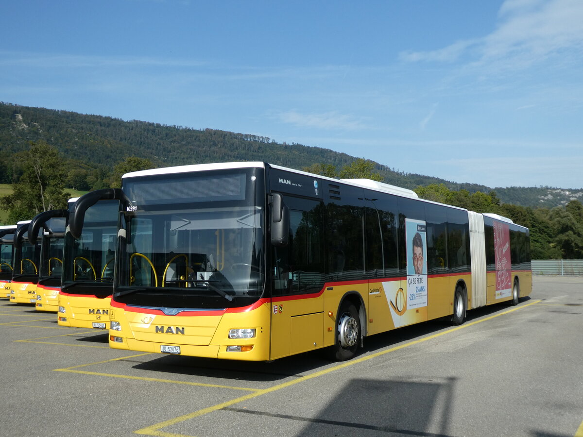 (228'284) - CarPostal Ouest - JU 52'076 - MAN (ex Nr. 38) am 25. September 2021 in Develier, Parkplatz