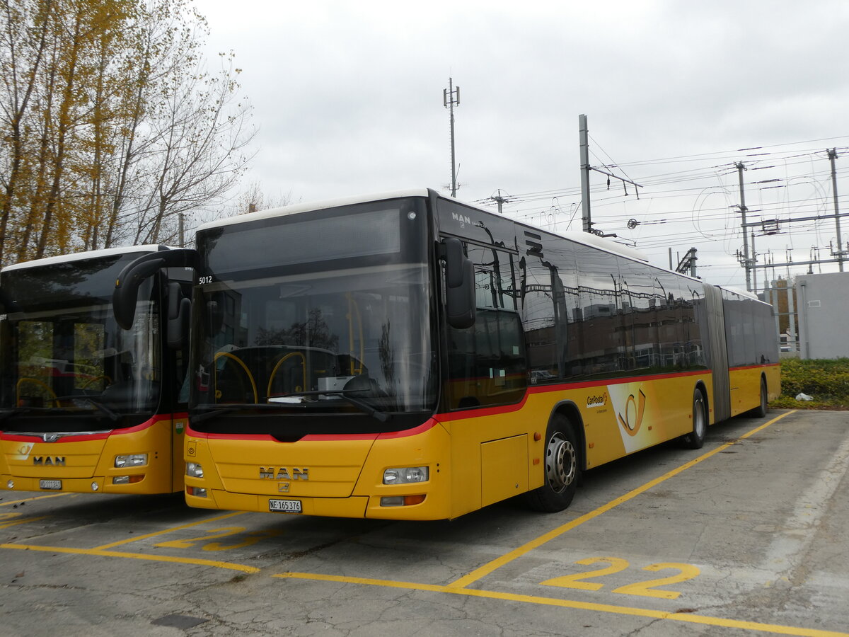 (230'646) - CarPostal Ouest - NE 165'376 - MAN (ex VD 495'042) am 13. November 2021 in Yverdon, Garage