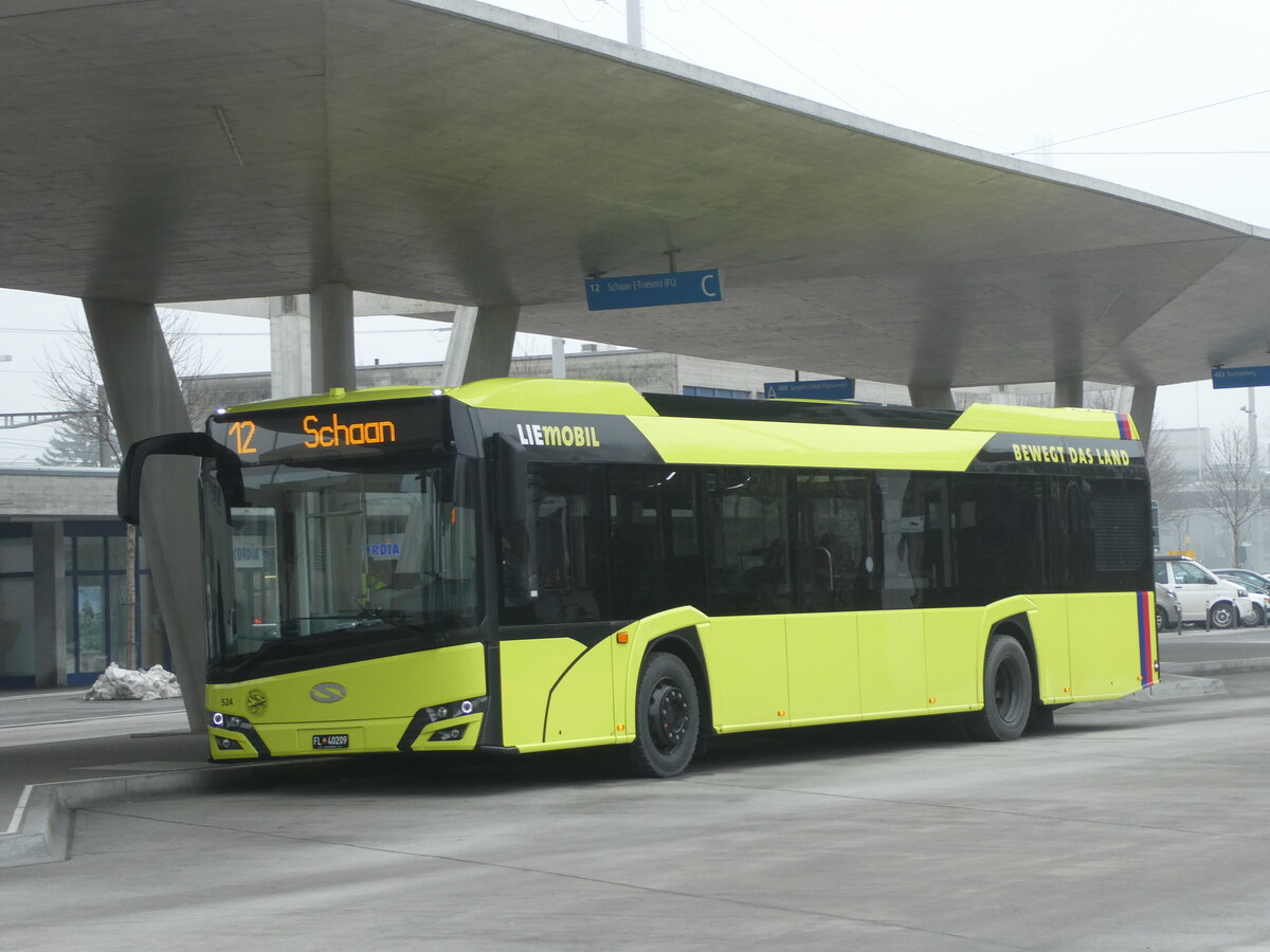 (231'345) - Aus Liechtenstein: BOS PS Anstalt, Vaduz - Nr. 524/FL 40'209 - Solaris am 15. Dezember 2021 beim Bahnhof Buchs