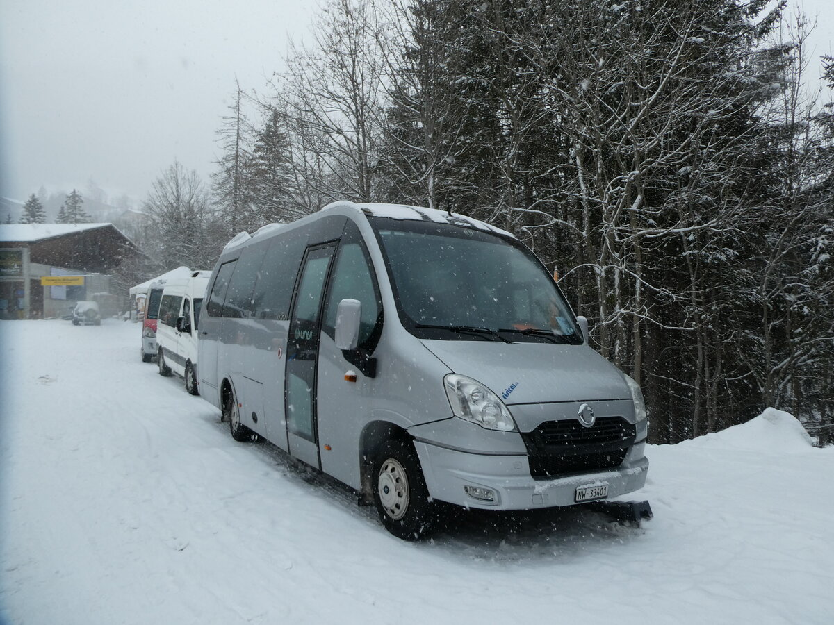 (231'923) - Risicar, Dallenwil - NW 33'401 - Irisbus/UNVI am 9. Januar 2022 in Adelboden, ASB