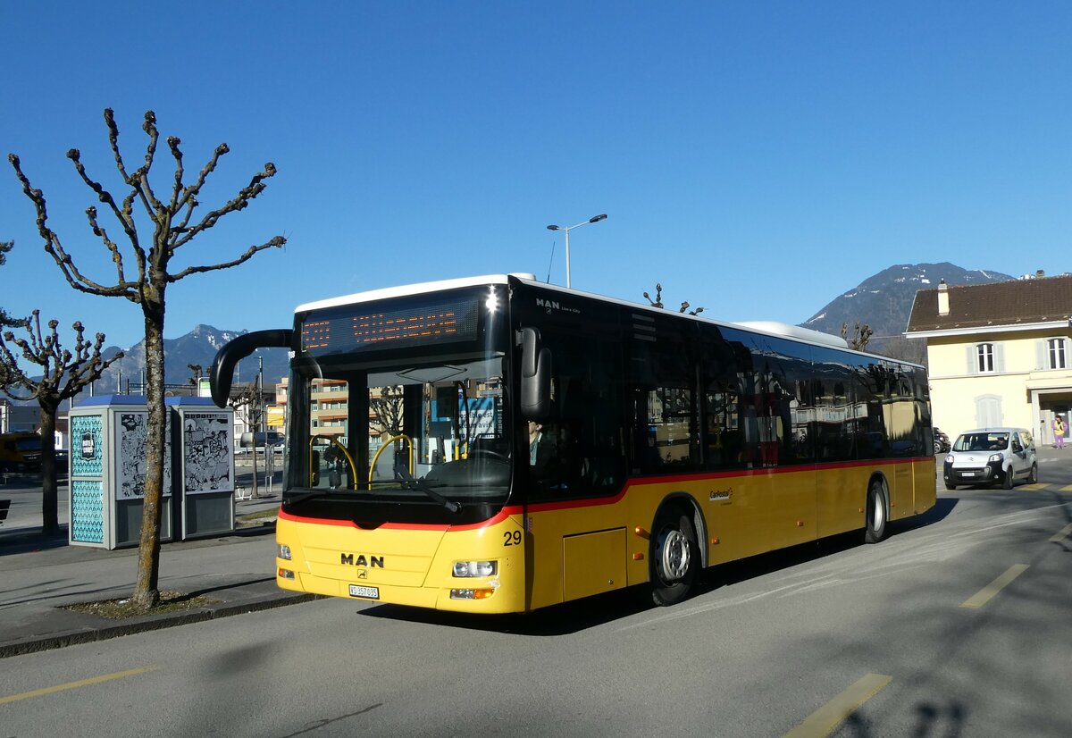 (233'225) - MOB Montreux - Nr. 29/VS 357'035 - MAN am 26. Februar 2022 beim Bahnhof Monthey CFF