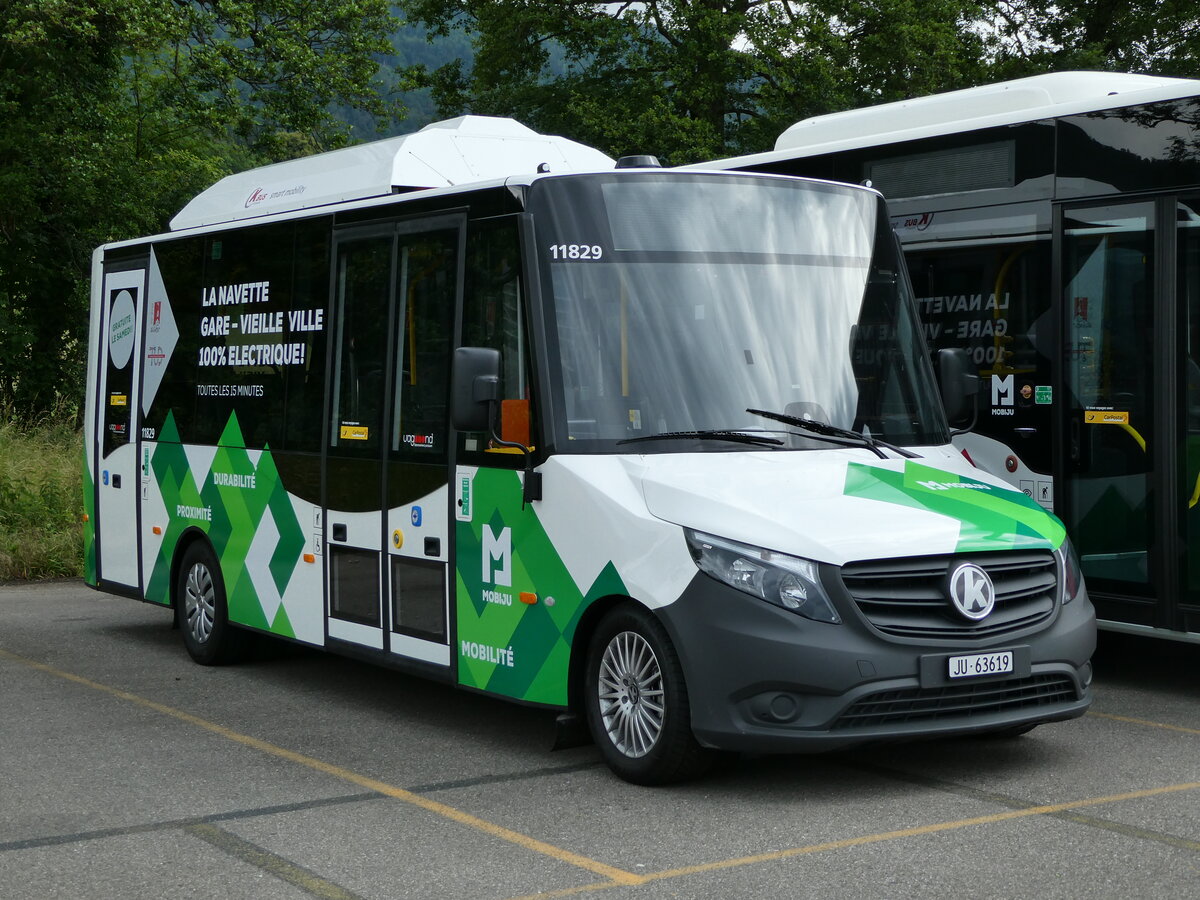 (236'885) - CarPostal Ouest - JU 63'619 - K-Bus am 6. Juni 2022 in Develier, Parkplatz