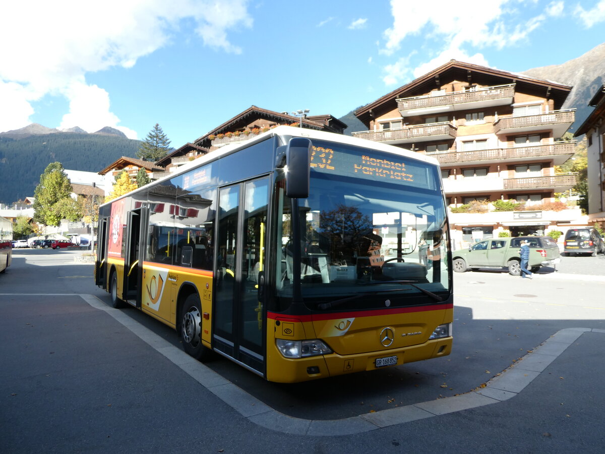 (241'140) - PostAuto Graubnden - GR 168'852 - Mercedes am 12. Oktober 2022 beim Bahnhof Klosters