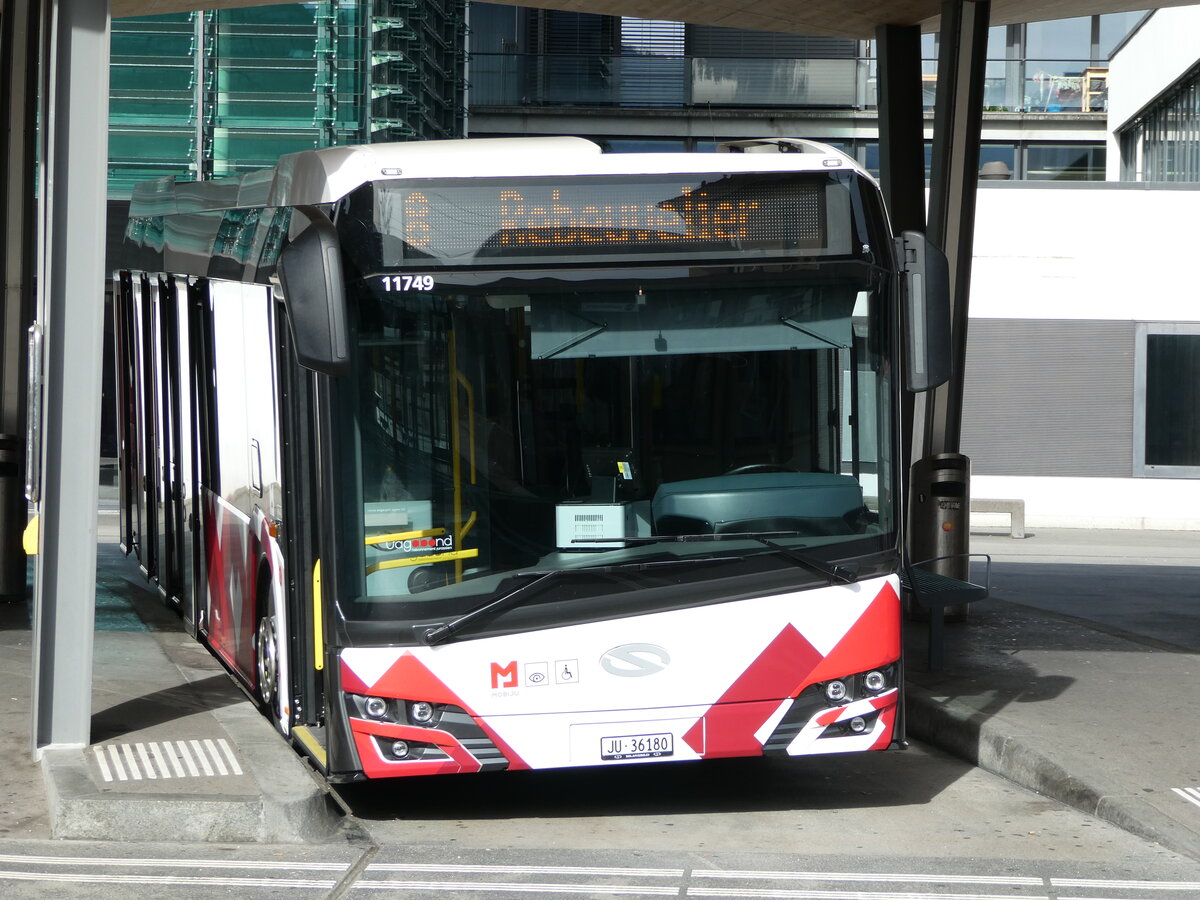 (241'948) - CarPostal Ouest - JU 36'180 - Solaris am 29. Oktober 2022 beim Bahnhof Delmont