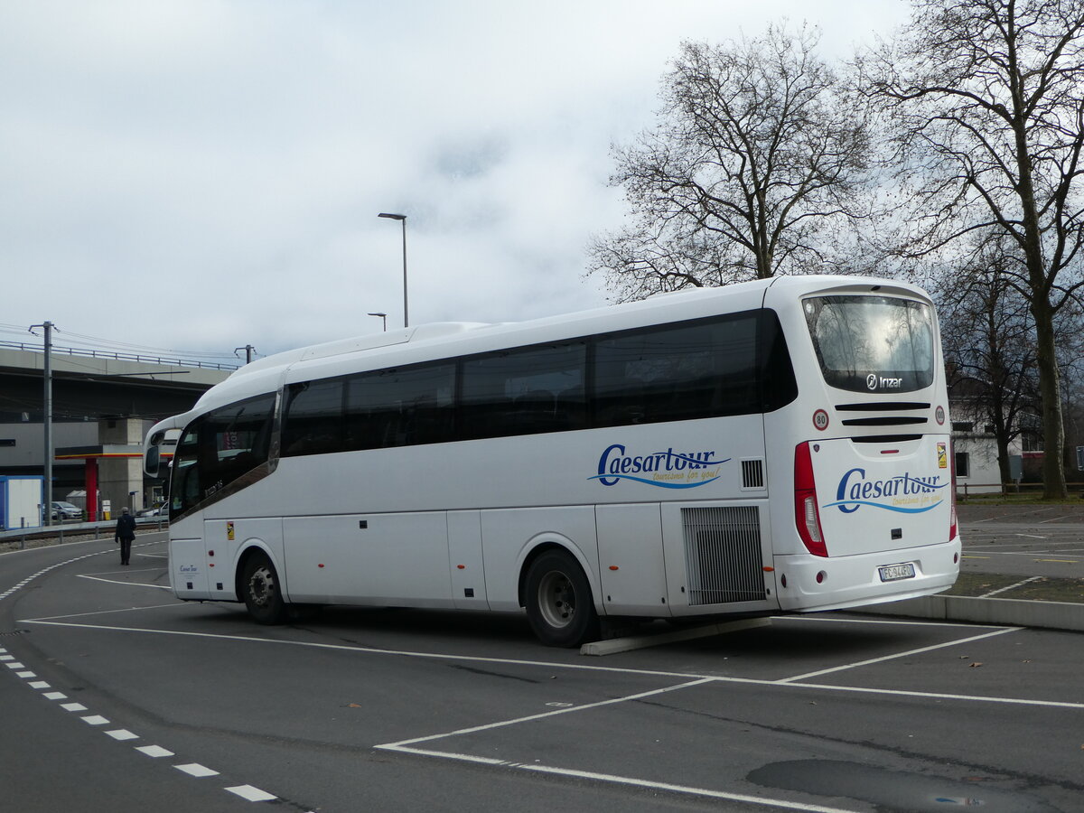 (244'018) - Aus Italien: Caesartour, Milano - FC-944 FD - Scania/Irizar am 18. Dezember 2022 beim Bahnhof Interlaken Ost