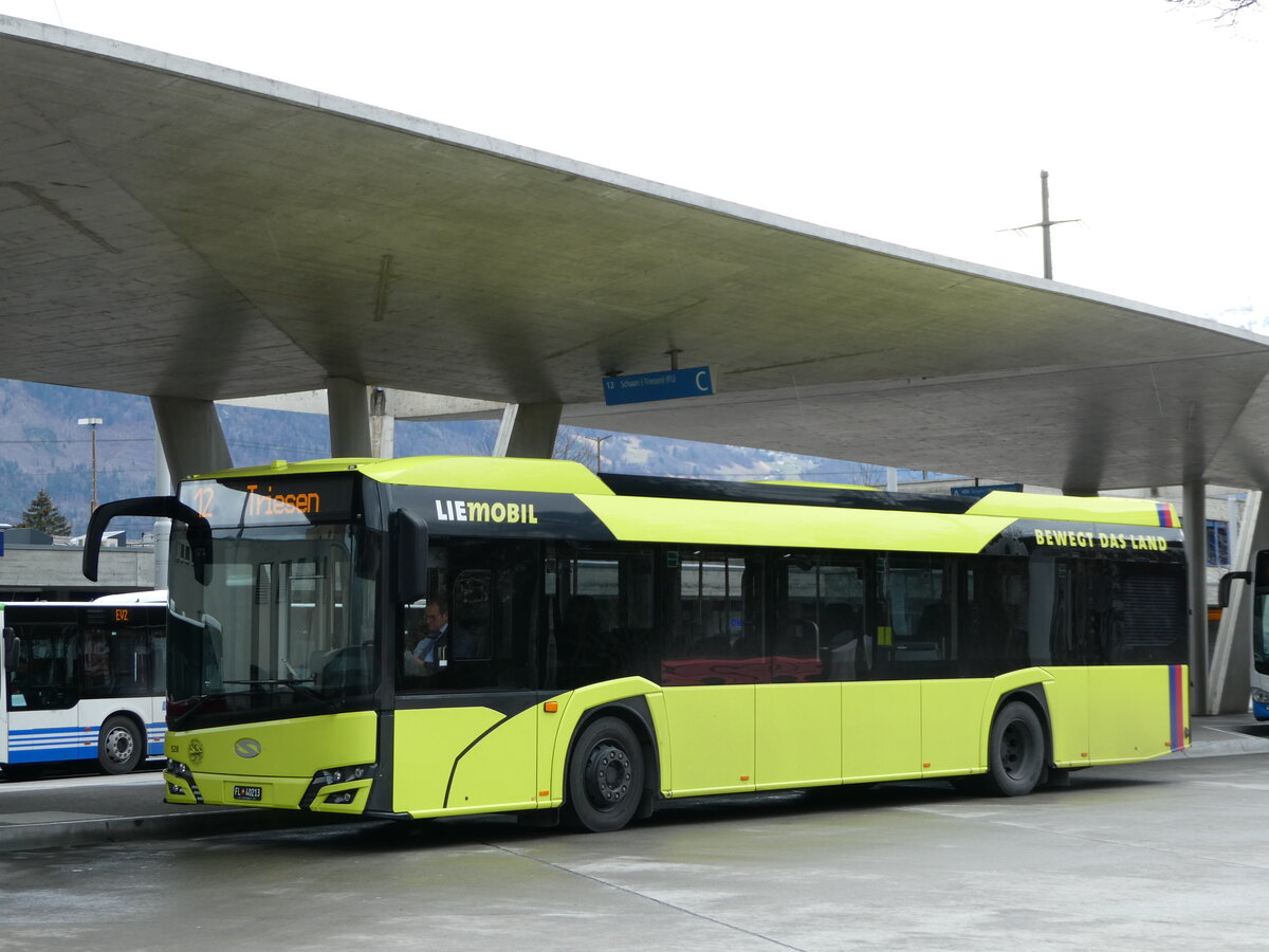 (247'007) - Aus Liechtenstein: BOS PS Anstalt, Vaduz - Nr. 528/FL 40'213 - Solaris am 9. März 2023 beim Bahnhof Buchs