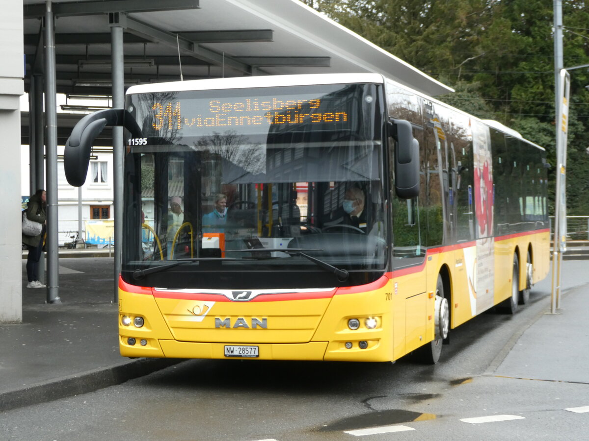 (247'076) - PostAuto Zentralschweiz - Nr. 701/NW 28'577/PID 11'595 - MAN (ex Nr. 71) am 10. März 2023 beim Bahnhof Stans