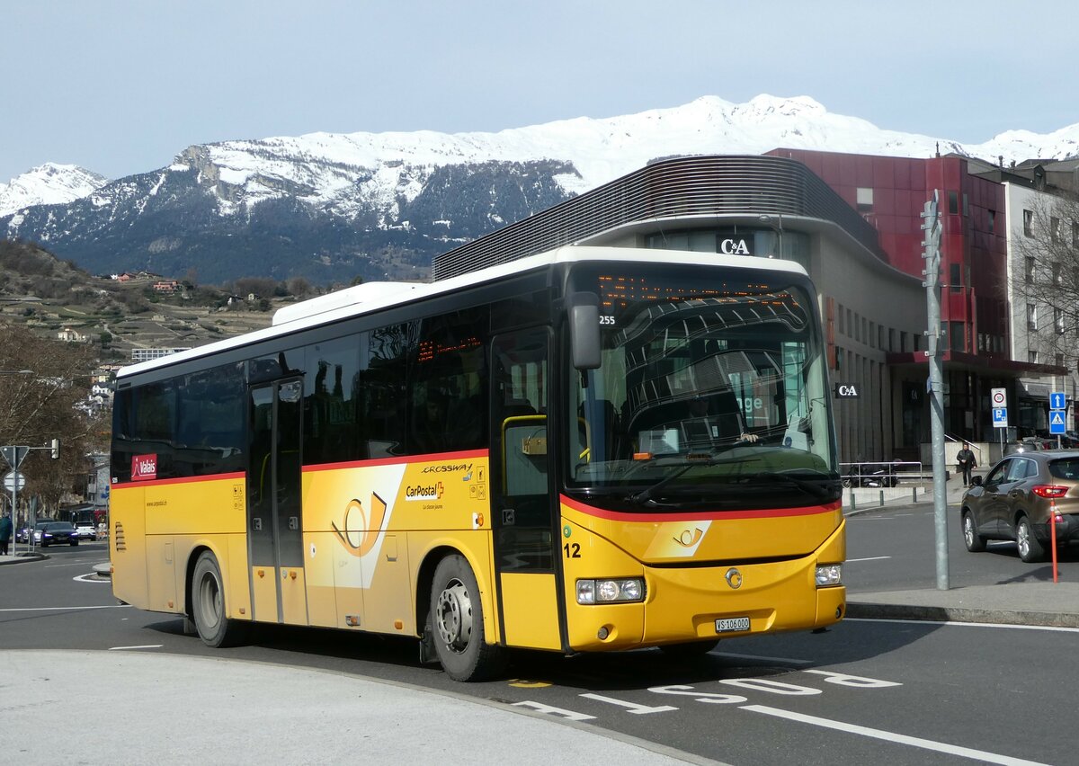 (247'241) - PostAuto Wallis - Nr. 12/VS 106'000/PID 5255 - Irisbus (ex Theytaz, Sion) am 16. Mrz 2023 beim Bahnhof Sion