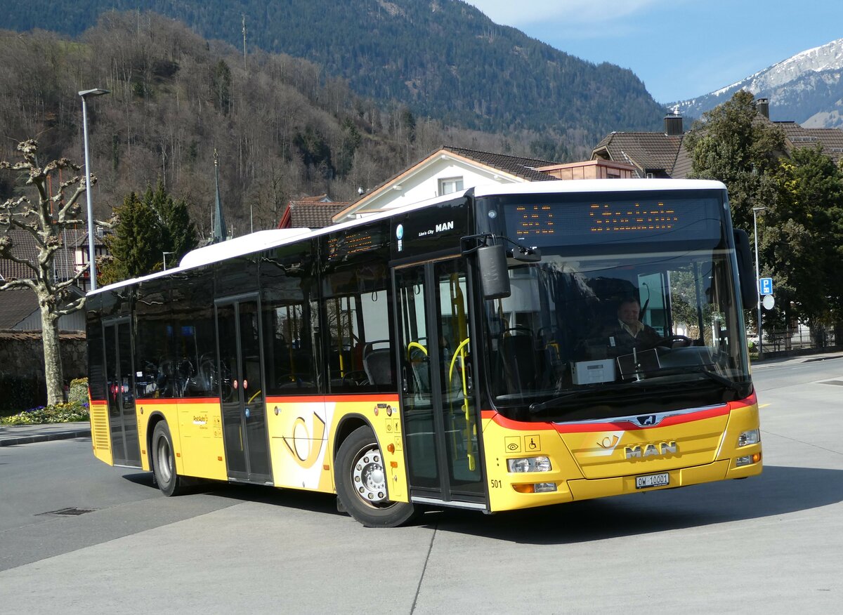 (247'437) - PostAuto Zentralschweiz - Nr. 501/OW 10'001/PID 10'265 - MAN (ex Nr. 9; ex Dillier, Sarnen Nr. 9) am 18. Mrz 2023 beim Bahnhof Sarnen