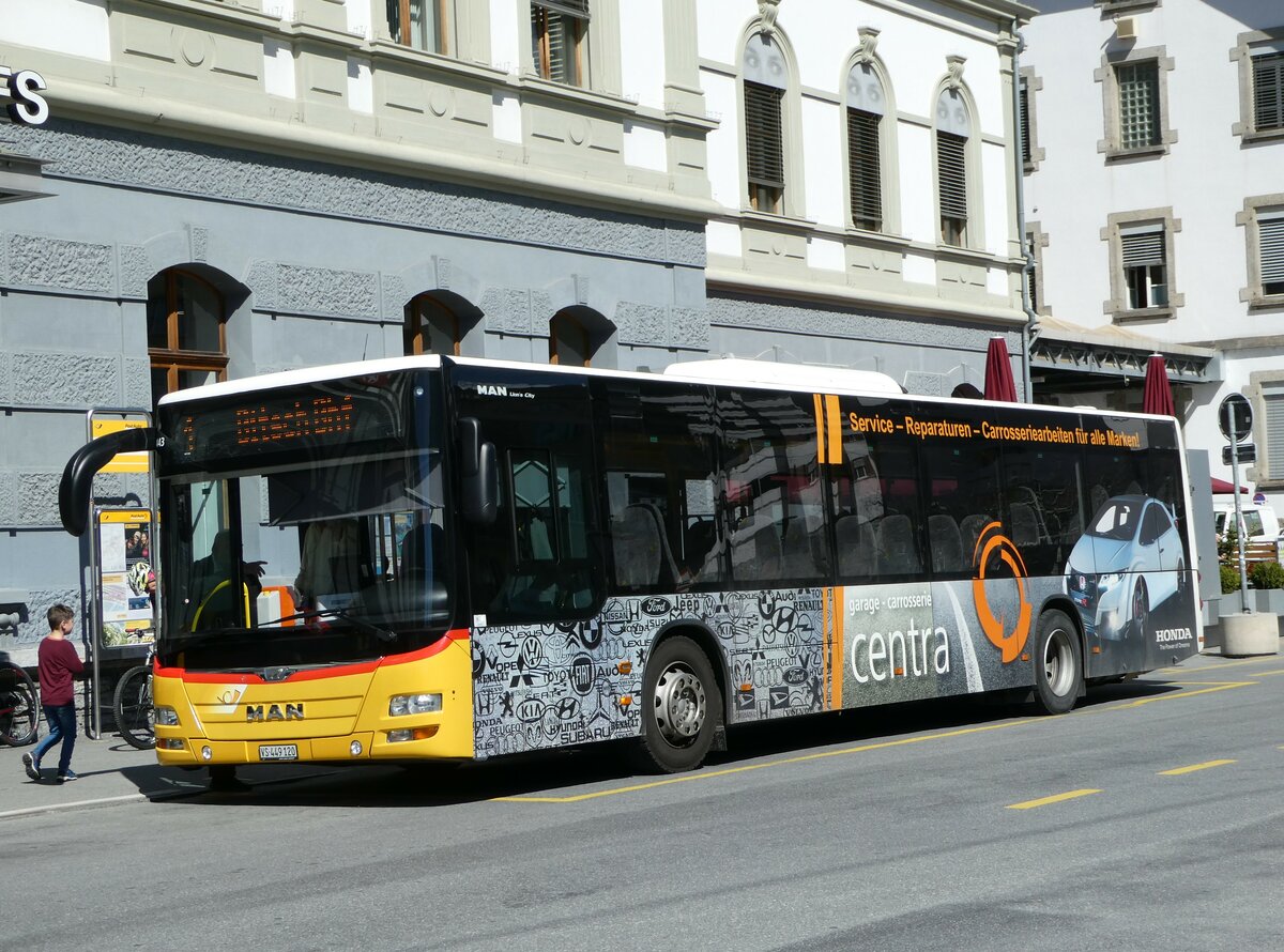 (248'325) - PostAuto Wallis - VS 449'120/PID 10'443 - MAN am 9. April 2023 beim Bahnhof Brig