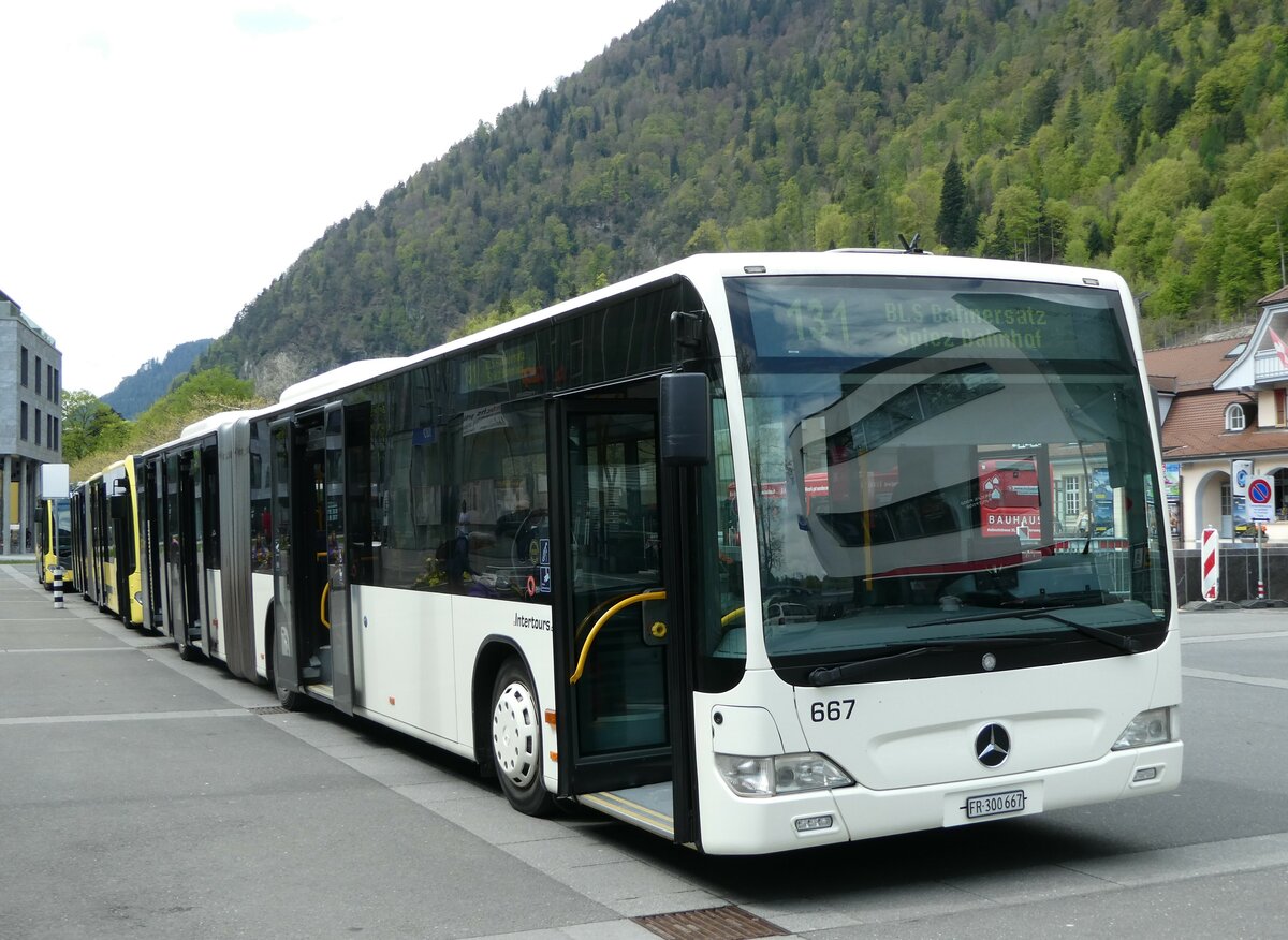 (249'423) - Intertours, Domdidier - Nr. 667/FR 300'667 - Mercedes (ex Nr. 666; ex STI Thun Nr. 137) am 2. Mai 2023 beim Bahnhof Interlaken Ost