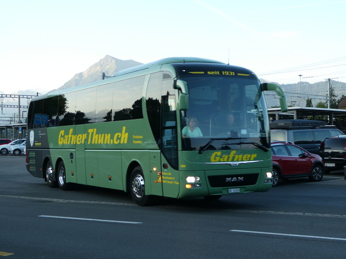 (253'894) - Gafner, Gwatt - Nr. 100/BE 26'288 - MAN (ex PostAuto Bern PID 10'654) am 19. August 2023 beim Bahnhof Thun