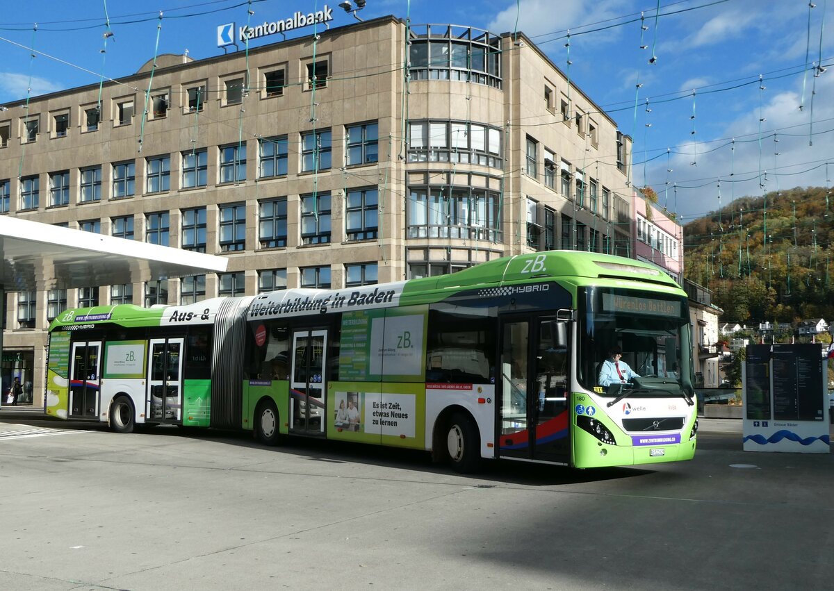 (256'792) - RVBW Wettingen - Nr. 180/AG 522'629 - Volvo am 6. November 2023 beim Bahnhof Baden