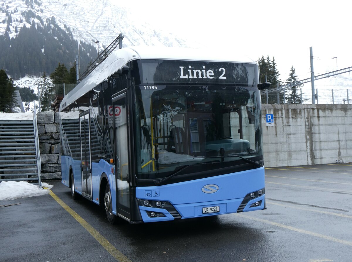 (259'257) - Mattli, Wassen - UR 9221/PID 11'795 - eSolaris (ex PostAuto Bern BE 90'275; ex PostAuto Bern BE 610'546) am 10. Februar 2024 in Andermatt, Bahnhofplatz