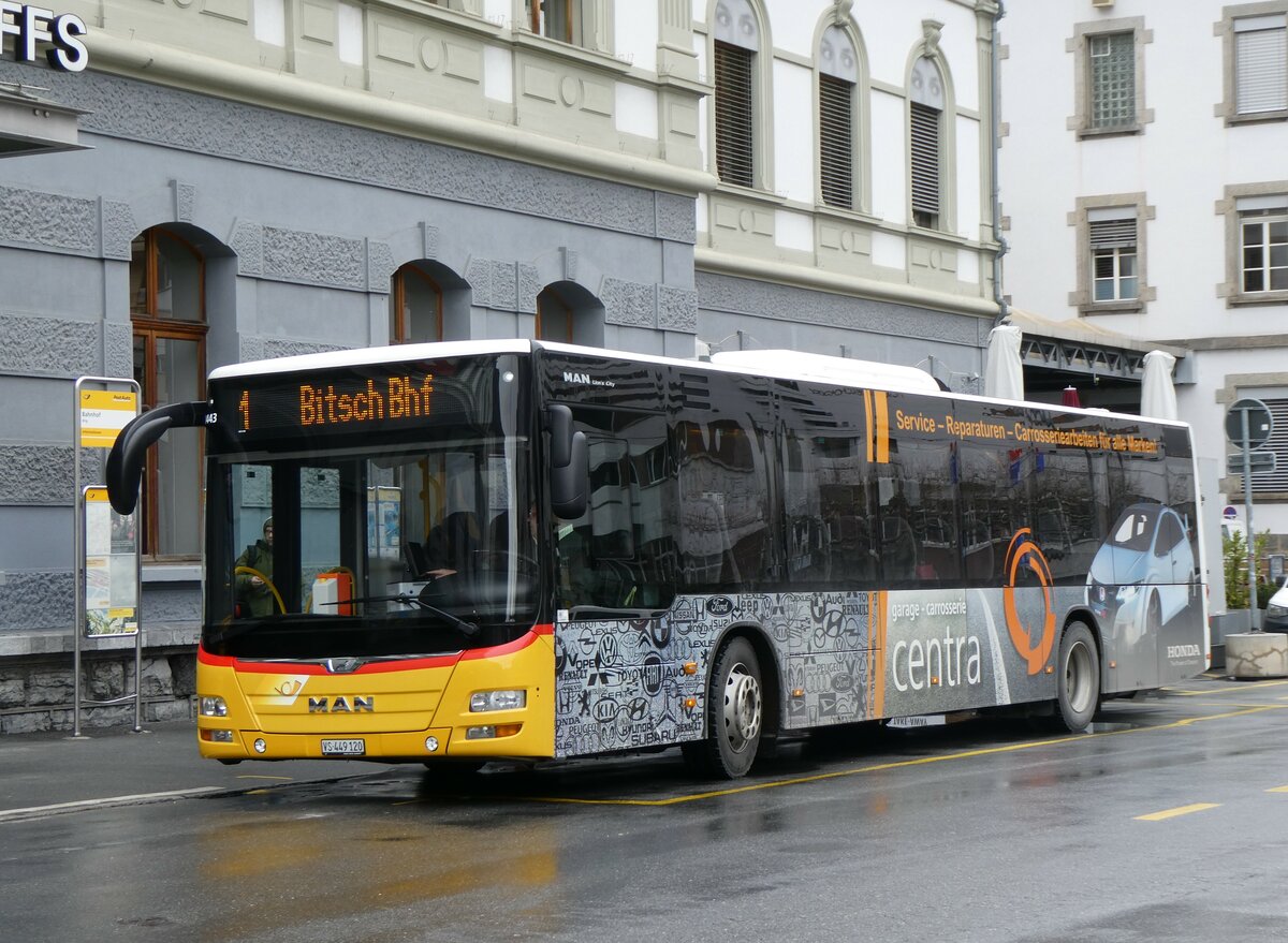 (259'769) - PostAuto Wallis - VS 449'120/PID 10'443 - MAN am 27. Februar 2024 beim Bahnhof Brig