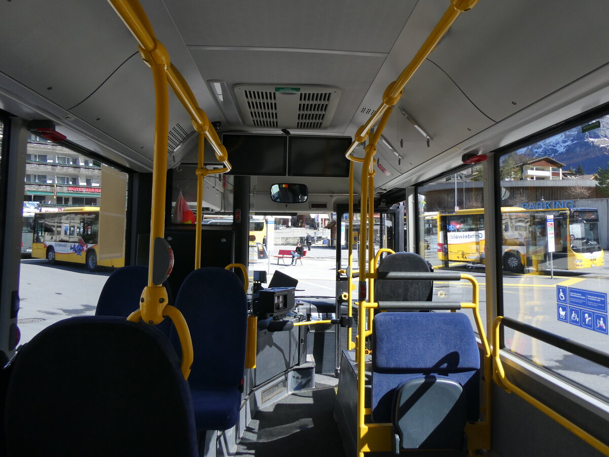 (260'524) - GrindelwaldBus, Grindelwald - Nr. 17/BE 72'444 - MAN/Gppel (ex STI Thun Nr. 133) am 19. Mrz 2024 beim Bahnhof Grindelwald (Innenaufnahme)