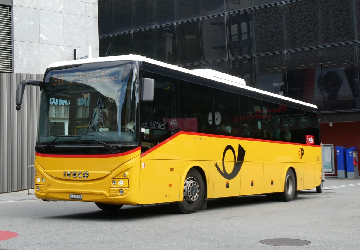 (265'389) - PostAuto Wallis - VS 516'248/PID 11'507 - Iveco am 3. August 2024 beim Bahnhof Visp