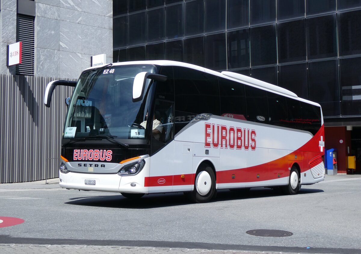 (265'471) - ARAG Ruswil - Nr. 48/LU 288'539 - Setra am 8. August 2024 beim Bahnhof Visp