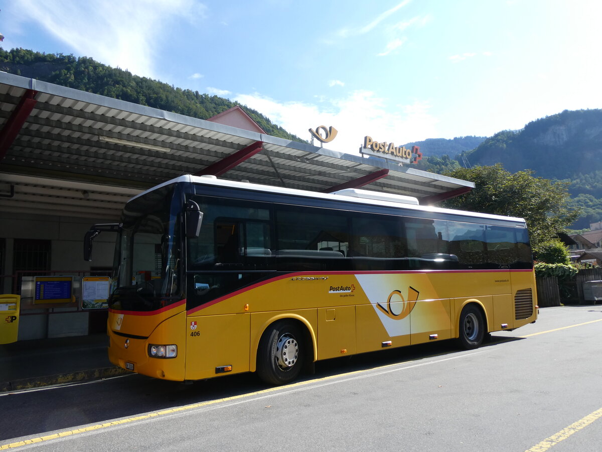 (265'582) - PostAuto Zentralschweiz - Nr. 406/OW 10'006/PID 5538 - Irisbus (ex Nr. 3; ex Dillier, Sarnen Nr. 3) am 13. August 2024 in Meiringen, Postautostation