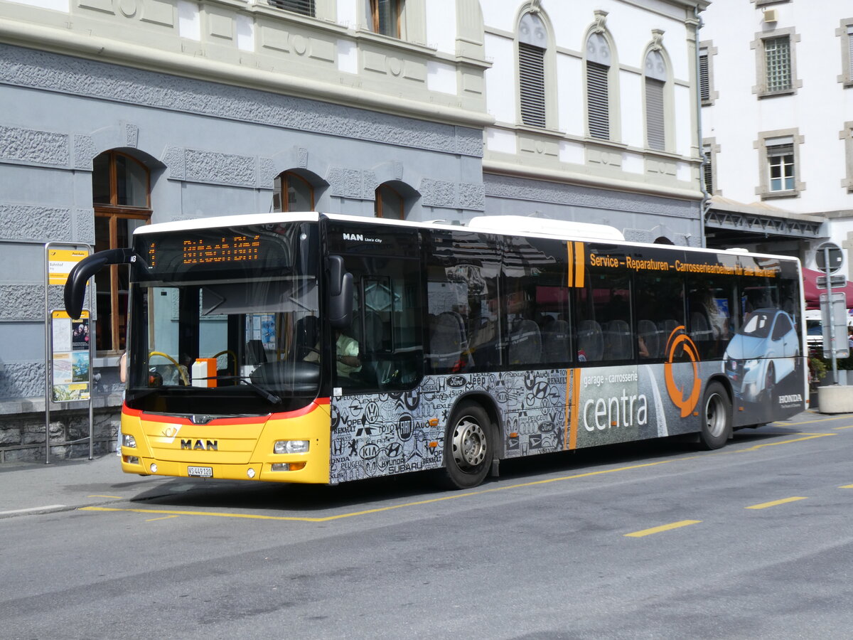 (265'754) - PostAuto Wallis - VS 449'120/PID 10'443 - MAN am 16. August 2024 beim Bahnhof Brig